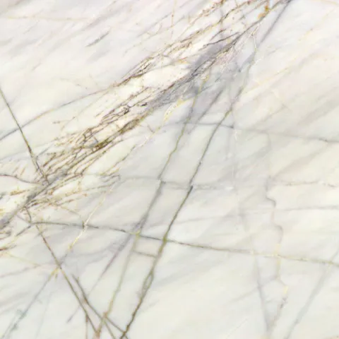 Close-up of Karyamar’s White Aurora natural stone, showcasing a bright white background with delicate veining, perfect for luxury interiors and architectural applications