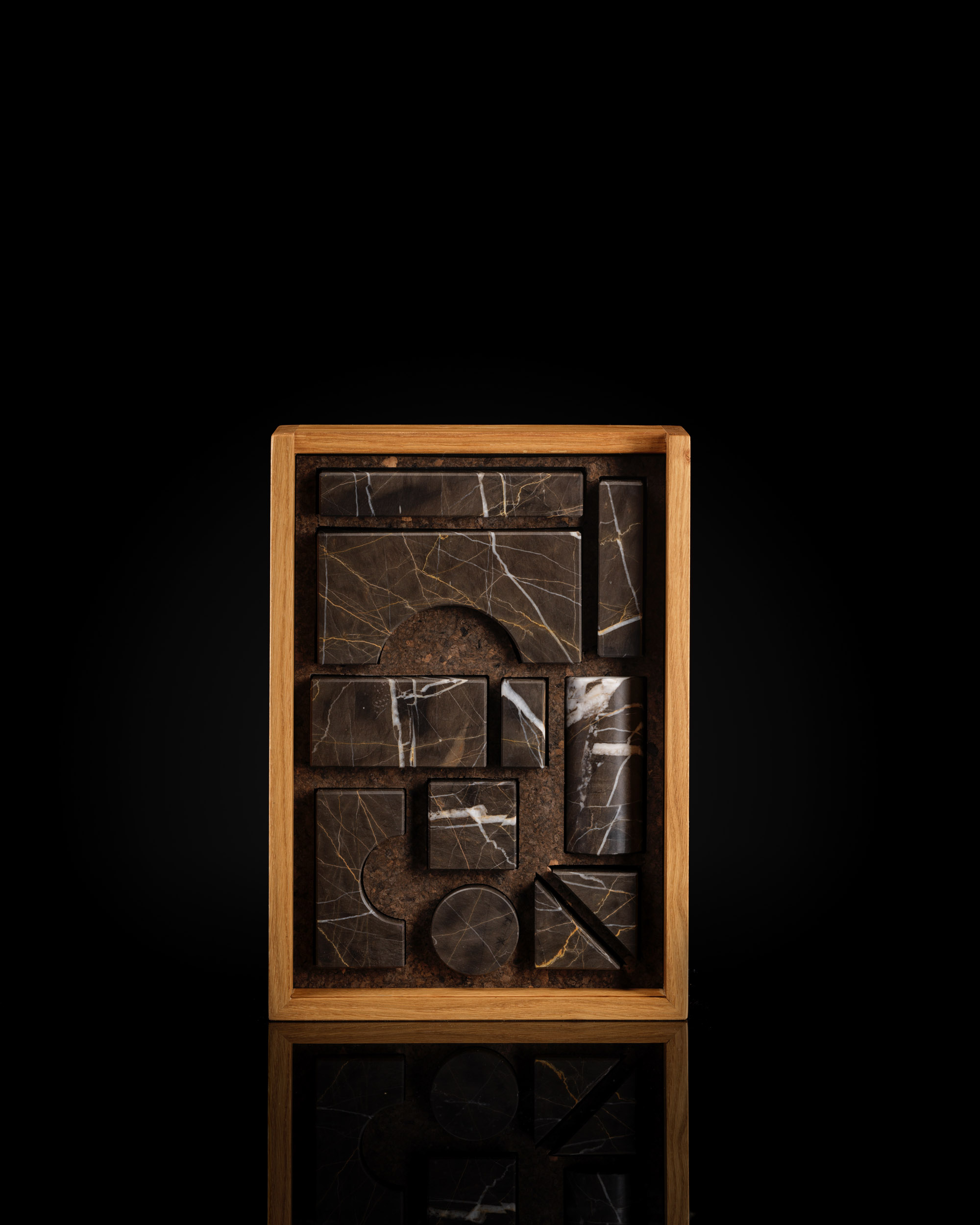 Close-up of Karyamar’s Mediterranean Night natural stone, showcasing rich dark tones and elegant veining, perfect for luxury interiors and architectural designs