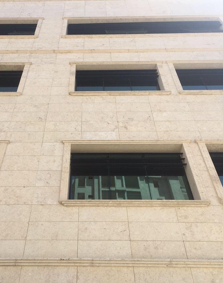 Close-up of Karyamar’s Travertine Seashell natural stone with soft beige hues and delicate patterns, perfect for luxury interiors and architectural designs