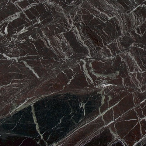 Close-up of Karyamar’s Cherry natural stone with deep red hues and subtle veining, perfect for luxury interior and architectural applications