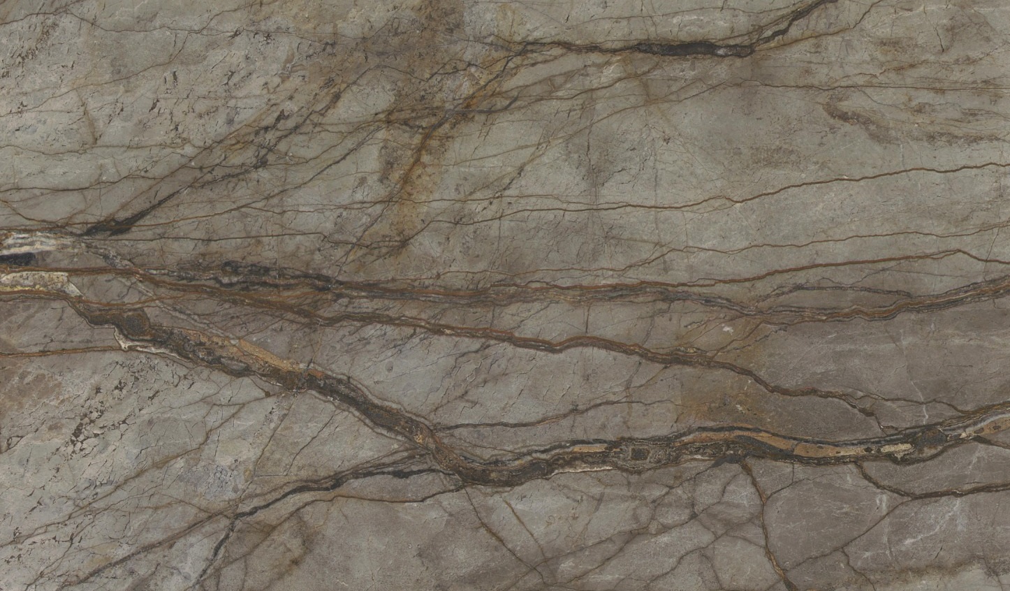 Close-up of Karyamar’s Deep Brown natural stone with deep chocolate hues and intricate veining, perfect for luxury interiors and architectural projects