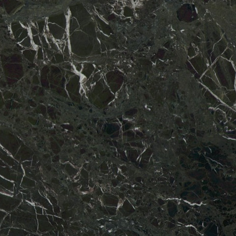 Close-up of Karyamar’s Flame Green natural stone, showcasing bold green hues and dynamic veining, ideal for high-end architectural and interior applications.