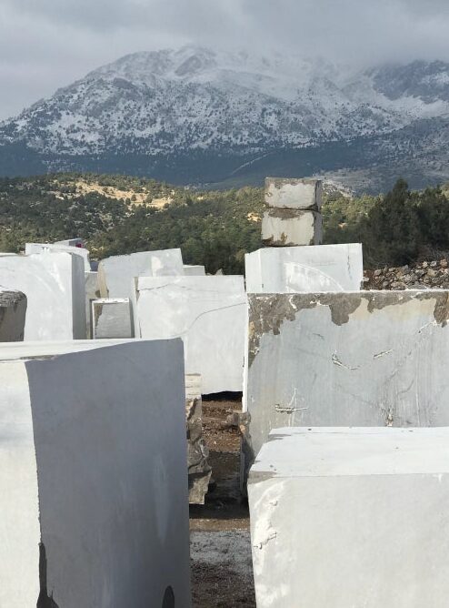 Close-up of Karyamar’s Nebula Dark Gray natural stone, showcasing deep gray tones and intricate veining, perfect for luxury interiors and architectural applications