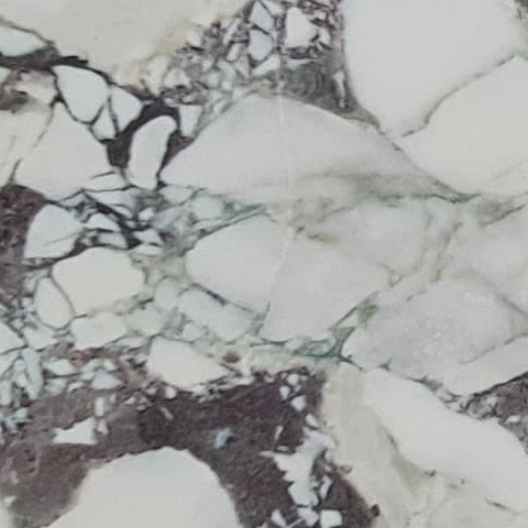 Close-up of Karyamar’s White Jade Violet natural stone, featuring soft white tones and striking violet veining, ideal for luxury interior and architectural applications