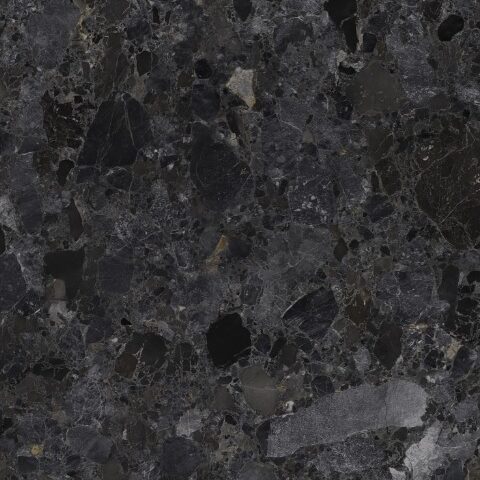 Close-up of Dark Conglomerate natural stone with rich dark tones and intricate patterns, ideal for luxurious interior and architectural projects.