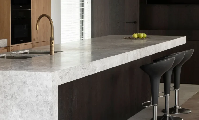 Close-up of Karyamar’s Nebula Dark Gray natural stone, showcasing deep gray tones and intricate veining, perfect for luxury interiors and architectural applications