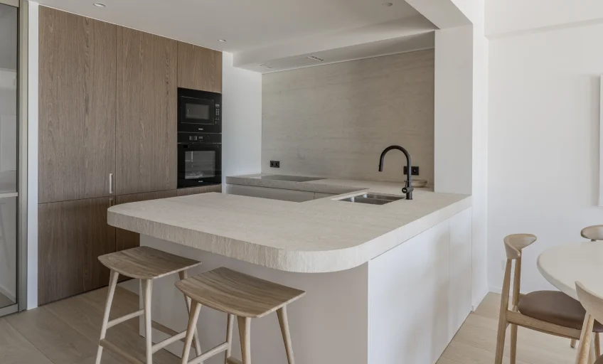 Close-up of Karyamar’s Travertine Greige natural stone, showcasing warm beige and soft gray hues with delicate veining, perfect for luxury interiors and architectural projects